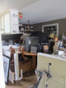 The kitchen, dining room and living room are storing all contents of the home at this point.